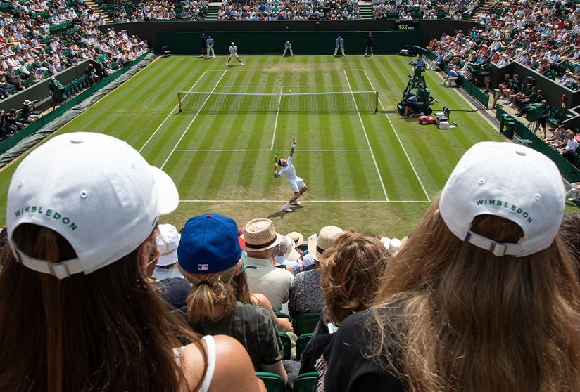 photo of a crowd watching a tennis match