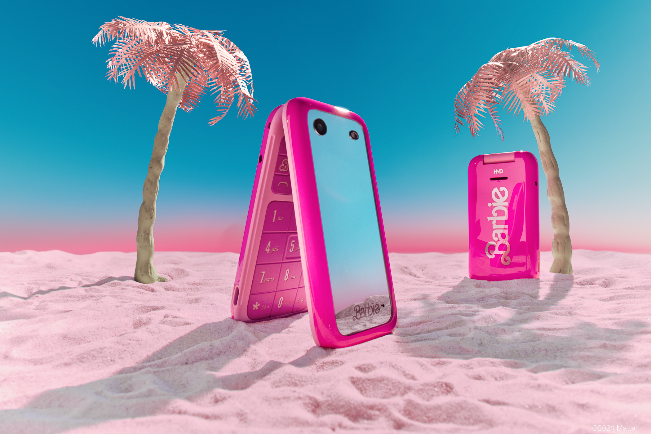 HMD Barbie phone on beach.