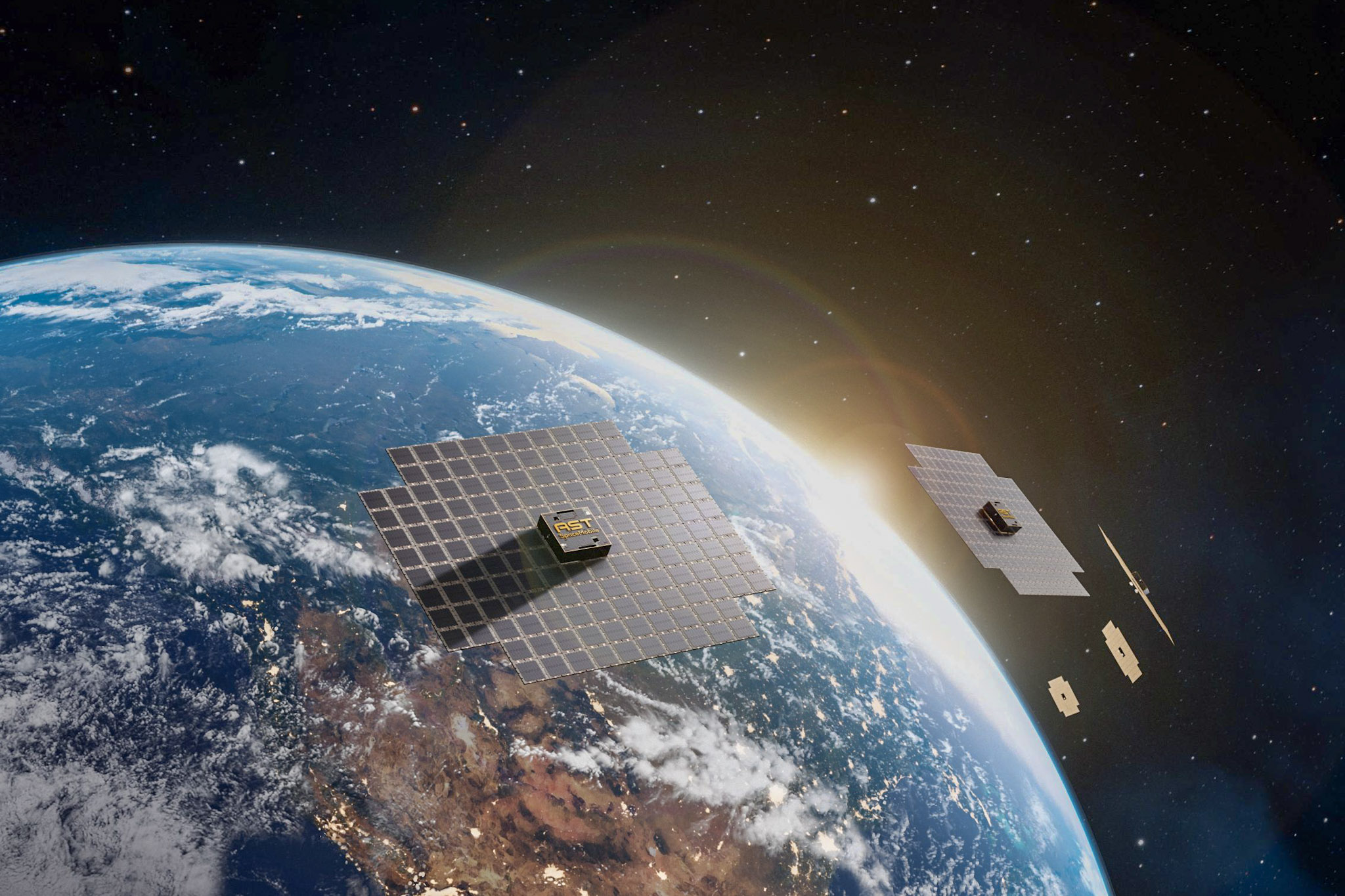 an artist's impression of AST SpaceMobile satellites orbiting the planet